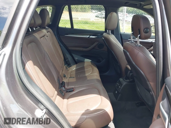 2017 BMW X1 xDrive28i with VIN WBXHT3Z38H4A55086, listed as a IAAI auction lot 42459276 with 101,907 mi miles and . Bid and sale history available at DreamBid. Image 8.