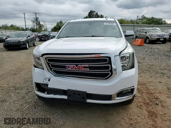 2017 GMC Yukon SLE with VIN 1GKS2AKC5HR185237, listed as a Copart auction lot 73799564 with 134,969 mi miles and Salvage Title. Bid and sale history available at carsss.com. Image 12.