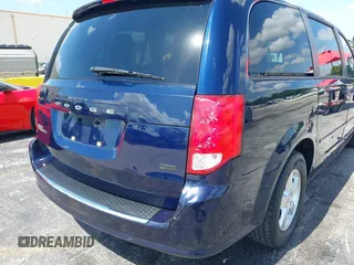 2013 Dodge Grand Caravan SXT with VIN 2C4RDGCG3DR611519, listed as a IAAI auction lot 42237571 with 156,858 mi miles and . Bid and sale history available at DreamBid. Image 6.
