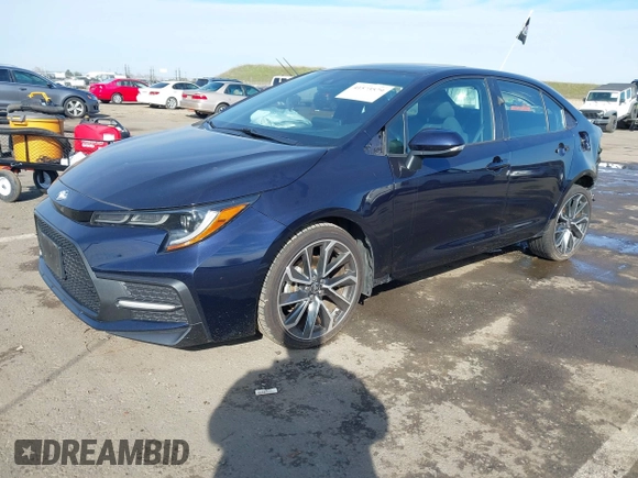 2021 Toyota Corolla SE with VIN 5YFP4MCE5MP082661, listed as a IAAI auction lot 41573579 with 58,418 mi miles and . Bid and sale history available at DreamBid. Image 18.