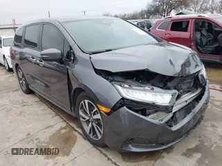 2021 Honda Odyssey Touring with VIN 5FNRL6H86MB021504, listed as a IAAI auction lot 41550040 with 55,068 mi miles. Bid and sale history available at carsss.com. Image 1.