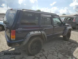 1997 Jeep Cherokee with VIN 1J4FN78S6VL604971, listed as a Copart auction lot 70690304 with 226,913 mi miles and Salvage title. Bid and sale history available at DreamBid. Image 3.