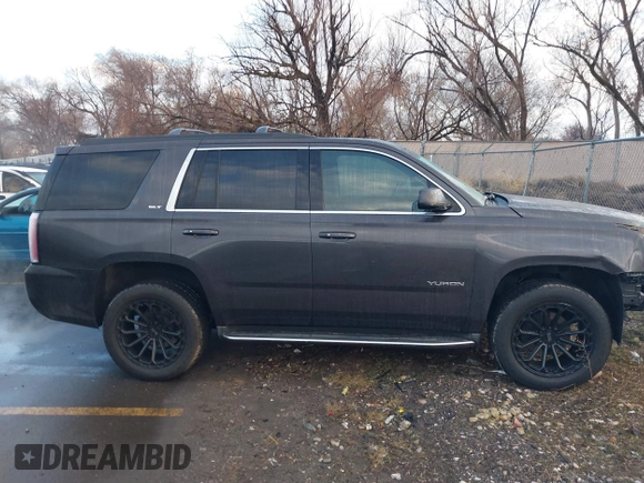 2015 GMC Yukon SLT with VIN 1GKS2BKC7FR110106, listed as a IAAI auction lot 41702260 with 108,679 mi miles. Bid and sale history available at carsss.com. Image 13.