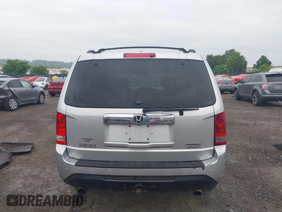 2013 Honda Pilot Touring z VIN 5FNYF4H96DB051005, wystawiony jako IAAI lot #42211189 z przebiegiem 215 594 mil mil oraz . Historia ofert i sprzedaży dostępna na DreamBid. Obrazek 16.