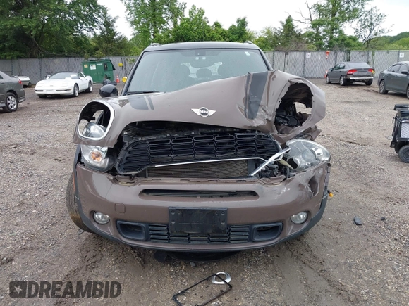 2014 MINI Countryman S with VIN WMWZC5C55EWP41717, listed as a IAAI auction lot 42324347 with Not provided miles and . Bid and sale history available at DreamBid. Image 13.