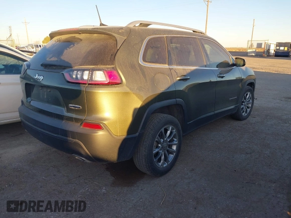 2019 Jeep Cherokee Latitude Plus with VIN 1C4PJLLN0KD164168, listed as a IAAI auction lot 41197248 with 118,278 mi miles and . Bid and sale history available at DreamBid. Image 4.