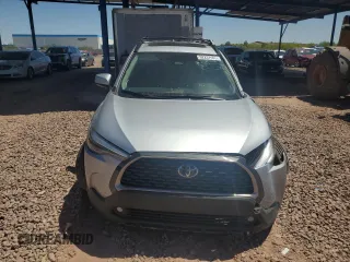 2023 Toyota Corolla Cross XLE with VIN 7MUDAAAG2PV050945, listed as a Copart auction lot 62237465 with 33,036 mi miles and Salvage title. Bid and sale history available at DreamBid. Image 5.