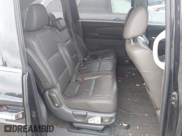 2015 Honda Odyssey Touring Elite with VIN 5FNRL5H90FB065004, listed as a IAAI auction lot 42461597 with 317,523 mi miles and . Bid and sale history available at DreamBid. Image 8.