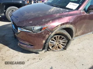 2019 Mazda CX-5 Sport with VIN JM3KFABM2K0686372, listed as a IAAI auction lot 41770183 with 57,202 mi miles and . Bid and sale history available at DreamBid. Image 6.