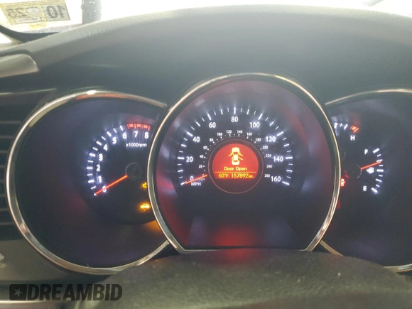 2012 Kia Optima LX with VIN 5XXGM4A73CG078569, listed as a Copart auction lot 49129255 with 157,892 mi miles and Salvage Title. Bid and sale history available at carsss.com. Image 9.