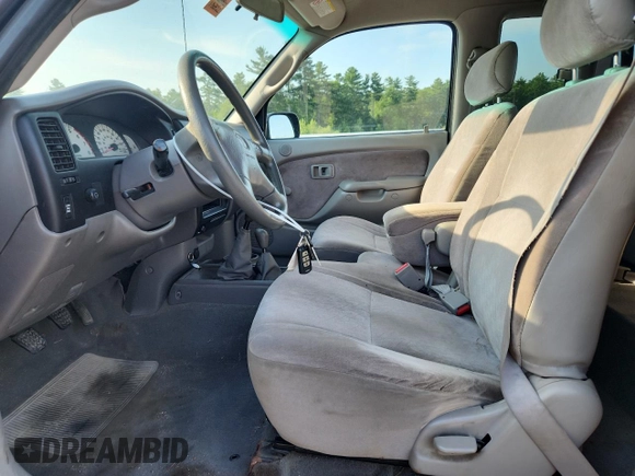 2002 Toyota Tacoma with VIN 5TEWM72NX2Z051332, listed as a Copart auction lot 66688465 with 185,611 mi miles and Clean title. Bid and sale history available at DreamBid. Image 7.