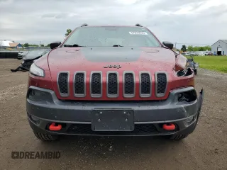 2014 Jeep Cherokee Trailhawk z VIN 1C4PJMBS2EW130125, wystawiony jako Copart lot #57830635 z przebiegiem 117 811 mil mil oraz Szkody całkowita. Historia ofert i sprzedaży dostępna na DreamBid. Obrazek 5.