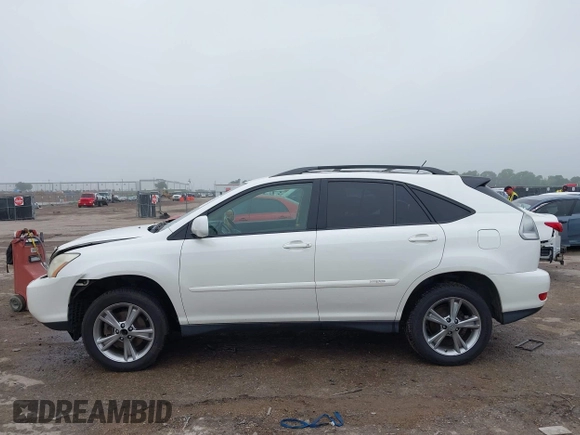 2007 Lexus RX 400h z VIN JTJGW31U572003651, wystawiony jako IAAI lot #42163515 z przebiegiem 358 648 mil mil oraz . Historia ofert i sprzedaży dostępna na DreamBid. Obrazek 14.