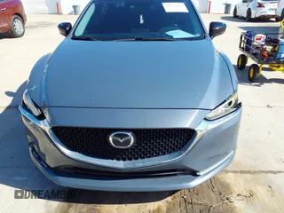 2021 Mazda 6 Carbon Edition with VIN JM1GL1WY4M1619533, listed as a IAAI auction lot 41979213 with 84,783 mi miles and . Bid and sale history available at DreamBid. Image 12.