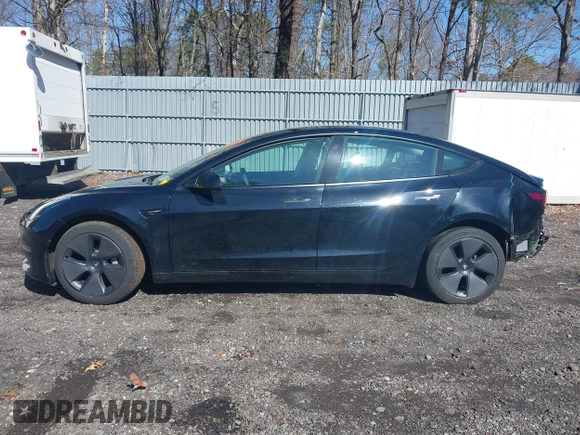 2023 Tesla Model 3 Long Range with VIN 5YJ3E1EB1PF392027, listed as a IAAI auction lot 41983638 with 31,415 mi miles and . Bid and sale history available at DreamBid. Image 13.