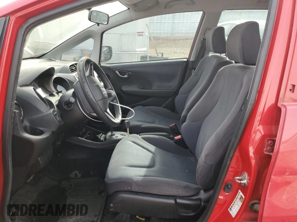 2009 Honda Fit with VIN JHMGE882X9S014265, listed as a Copart auction lot 51140695 with 130,809 mi miles and Salvage Title. Bid and sale history available at carsss.com. Image 7.