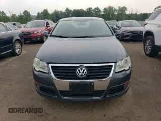 2009 Volkswagen Passat Komfort z VIN WVWJK73CX9P055380, wystawiony jako Copart lot #65812774 z przebiegiem 170 237 mil mil oraz Tytuł czysty. Historia ofert i sprzedaży dostępna na DreamBid. Obrazek 5.