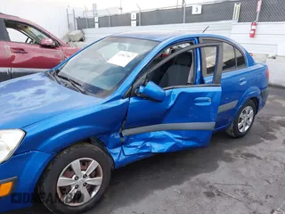 2008 Kia Rio LX with VIN KNADE123486365738, listed as a IAAI auction lot 41902367 with 248,194 mi miles. Bid and sale history available at carsss.com. Image 6.