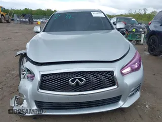 2015 Infiniti Q50 Premium z VIN JN1BV7AR8FM390785, wystawiony jako IAAI lot #42200437 z przebiegiem 94 841 mil mil oraz . Historia ofert i sprzedaży dostępna na DreamBid. Obrazek 12.
