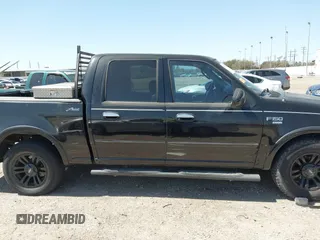 2003 Ford F-150 XLT with VIN 1FTRW07L43KB05221, listed as a IAAI auction lot 41762332 with 226,660 mi miles. Bid and sale history available at carsss.com. Image 13.