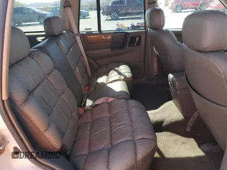 1995 Jeep Grand Cherokee Limited with VIN 1J4GZ78Y3SC701103, listed as a Copart auction lot 72038184 with 143,829 mi miles and Salvage Title. Bid and sale history available at carsss.com. Image 11.