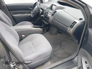 2007 Toyota Prius z VIN JTDKB20U573236900, wystawiony jako IAAI lot #42375325 z przebiegiem Nie podano mil oraz . Historia ofert i sprzedaży dostępna na DreamBid. Obrazek 5.