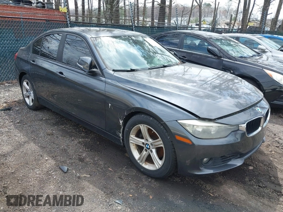 2013 BMW 3 Series 328i with VIN WBA3C1G50DNN93327, listed as a IAAI auction lot 41865009 with 175,371 mi miles and . Bid and sale history available at carsss.com. Image 1.