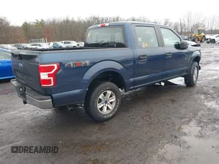 2019 Ford F-150 XL with VIN 1FTEW1EB3KFB10433, listed as a IAAI auction lot 41520139 with 104,405 mi miles and . Bid and sale history available at DreamBid. Image 4.