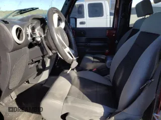 2010 Jeep Wrangler Unlimited Sahara with VIN 1J4BA5H1XAL196555, listed as a Copart auction lot 76704534 with 112,365 mi miles and Salvage Title. Bid and sale history available at carsss.com. Image 7.