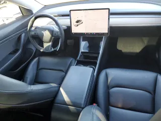 2020 Tesla Model 3 Standard Range Plus with VIN 5YJ3E1EA5LF660417, listed as a Copart auction lot 48144125 with 112,924 mi miles and Salvage Title. Bid and sale history available at DreamBid. Image 8.