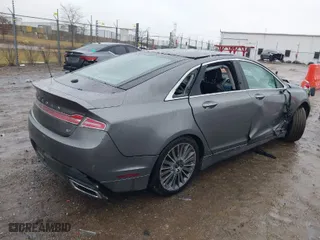 2014 Lincoln MKZ with VIN 3LN6L2GK2ER801312, listed as a IAAI auction lot 41209977 with 152,577 mi miles. Bid and sale history available at carsss.com. Image 4.