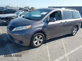 2014 Toyota Sienna LE AAS with VIN 5TDKK3DC6ES521706, listed as a IAAI auction lot 41999188 with 104,867 mi miles. Bid and sale history available at carsss.com. Image 17.