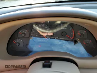 2004 Ford Mustang Deluxe with VIN 1FAFP44414F125267, listed as a Copart auction lot 74595714 with 0 mi miles and Salvage Title. Bid and sale history available at carsss.com. Image 9.