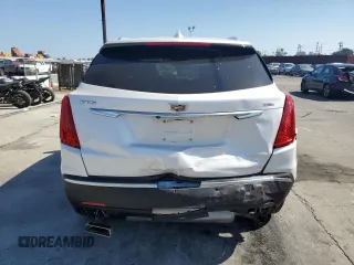 2019 Cadillac XT5 FWD with VIN 1GYKNARS1KZ121732, listed as a Copart auction lot 54882885 with 72,142 mi miles and Salvage title. Bid and sale history available at DreamBid. Image 6.