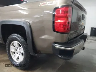2014 Chevrolet Silverado 1500 LT with VIN 1GCVKREC5EZ147506, listed as a IAAI auction lot 41736960 with 112,399 mi miles and . Bid and sale history available at DreamBid. Image 20.