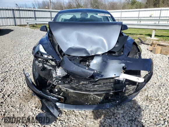 2022 Tesla Model 3 with VIN 5YJ3E1EA4NF371483, listed as a Copart auction lot 49287665 with 59,476 mi miles and Salvage Title. Bid and sale history available at DreamBid. Image 5.