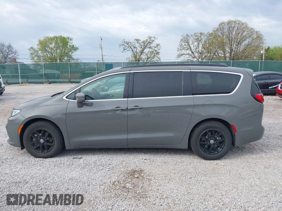 2022 Chrysler Pacifica Touring L with VIN 2C4RC1BG7NR168519, listed as a IAAI auction lot 41928929 with 55,814 mi miles and . Bid and sale history available at DreamBid. Image 14.