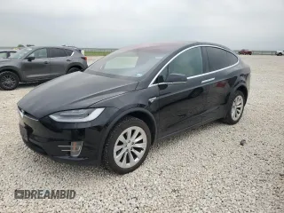 2016 Tesla Model X 70D with VIN 5YJXCBE22GF004980, listed as a Copart auction lot 49599605 with 155,015 mi miles and Salvage Title. Bid and sale history available at DreamBid. Image 1.