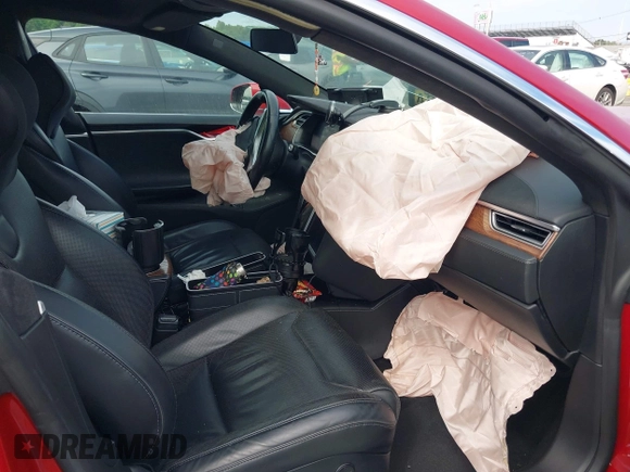 2016 Tesla Model S 90D z VIN 5YJSA1E4XGF171244, wystawiony jako IAAI lot #42584589 z przebiegiem 85 412 mil mil oraz . Historia ofert i sprzedaży dostępna na DreamBid. Obrazek 5.