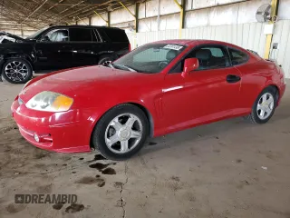 2003 Hyundai Tiburon GT z VIN KMHHN65F53U086483, wystawiony jako Copart lot #53391495 z przebiegiem 153 544 mil mil oraz Szkoda całkowita • Salvage title. Historia ofert i sprzedaży dostępna na DreamBid. Obrazek 1.