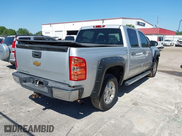 2013 Chevrolet Silverado 1500 LT with VIN 3GCPKSE71DG203443, listed as a IAAI auction lot 42033447 with 128,904 mi miles. Bid and sale history available at carsss.com. Image 4.