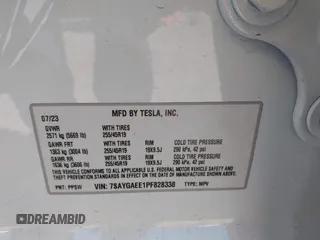 2023 Tesla Model Y Long Range with VIN 7SAYGAEE1PF828338, listed as a IAAI auction lot 40978725 with Not Provided miles and . Bid and sale history available at DreamBid. Image 9.