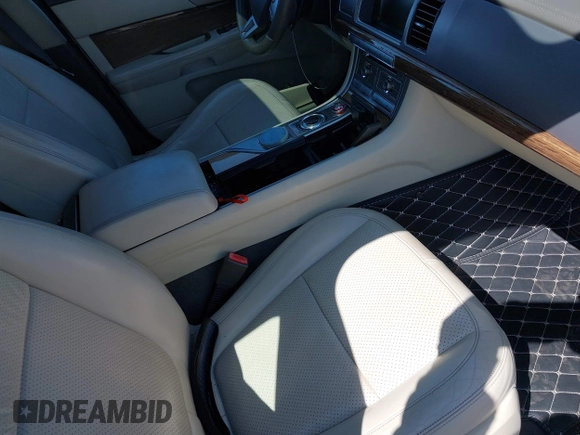 2009 Jaguar XF with VIN SAJWA07CX91R01263, listed as a IAAI auction lot 41994525 with 141,729 mi miles and . Bid and sale history available at DreamBid. Image 5.
