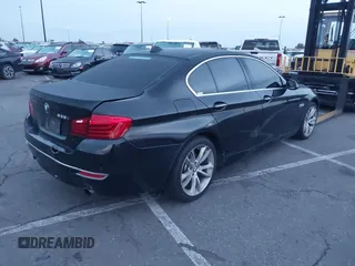 2014 BMW 5 Series 535i with VIN WBA5B1C54ED917047, listed as a IAAI auction lot 41727855 with 105,460 mi miles and . Bid and sale history available at DreamBid. Image 4.