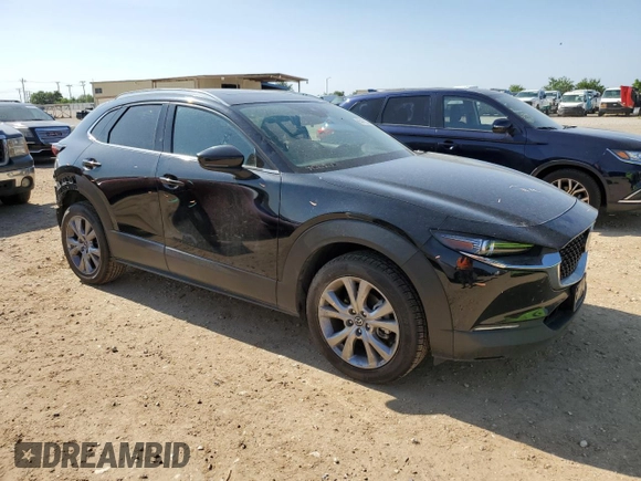 2020 Mazda CX-30 Premium with VIN 3MVDMBEM9LM112566, listed as a Copart auction lot 55473345 with 80,519 mi miles and Salvage title. Bid and sale history available at DreamBid. Image 4.