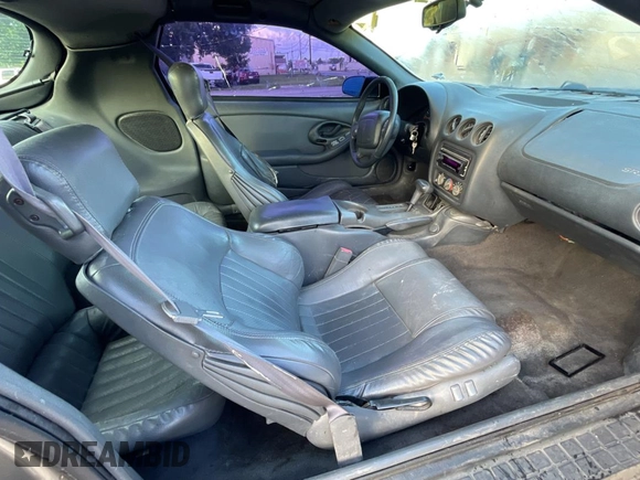 1999 Pontiac Firebird Formula with VIN 2G2FV22G1X2205745, listed as a Copart auction lot 65841425 with 142,913 mi miles and Clean title. Bid and sale history available at DreamBid. Image 5.
