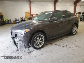 2019 Alfa Romeo Stelvio Ti z VIN ZASPAKBN3K7C29998, wystawiony jako Copart lot #54129185 z przebiegiem Nie podano mil oraz Szkoda całkowita • Salvage title. Historia ofert i sprzedaży dostępna na DreamBid. Obrazek 1.
