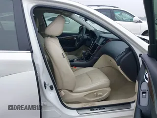 2014 Infiniti Q50 Premium z VIN JN1BV7AP4EM676324, wystawiony jako IAAI lot #42167934 z przebiegiem 114 670 mil mil oraz . Historia ofert i sprzedaży dostępna na DreamBid. Obrazek 5.