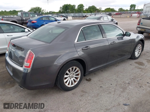 2013 Chrysler 300 with VIN 2C3CCAAG9DH707447, listed as a IAAI auction lot 42292077 with 171,329 mi miles and . Bid and sale history available at DreamBid. Image 4.