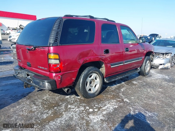 2005 Chevrolet Tahoe Z71 with VIN 1GNEC13T55R155842, listed as a IAAI auction lot 41321412 with 221,109 mi miles. Bid and sale history available at carsss.com. Image 4.
